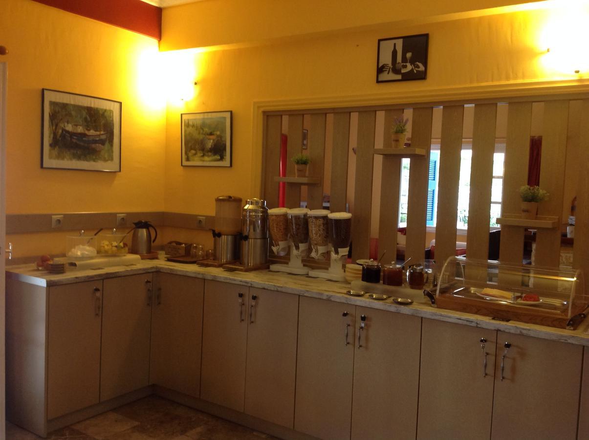 Hotel Nostos Frikes Luaran gambar